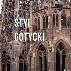 Kamienna wieża katedry w stylu **gotyk**, z misternymi detalami i ostrymi łukami, wznosi się ku niebu.